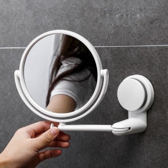 Зеркало в ванную имеет механизм вращения, позволяющий регулировать угол наклона . . фото 2