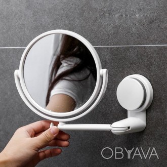 Зеркало в ванную имеет механизм вращения, позволяющий регулировать угол наклона . . фото 1