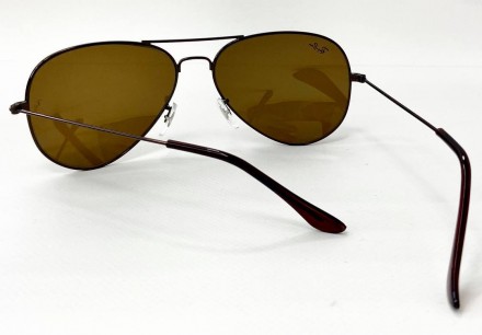 Солнцезащитные унисекс фирменные очки
	защита от ультрафиолета uv400;
	пол: унис. . фото 5