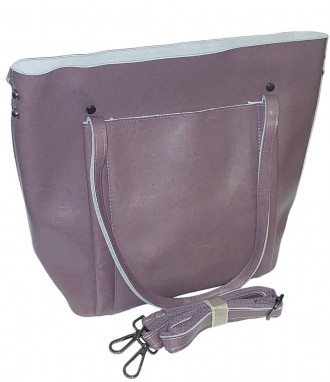 Кожаная женская сумка
Снаружи:
	одно основное отделение на молнии
	наружный карм. . фото 11