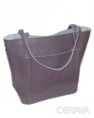 Кожаная женская сумка
Снаружи:
	одно основное отделение на молнии
	наружный карм. . фото 1