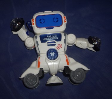 1) Музична іграшка - Робот - висота- 18 см,ширина- 27 см. Працює на з-х пальчико. . фото 4