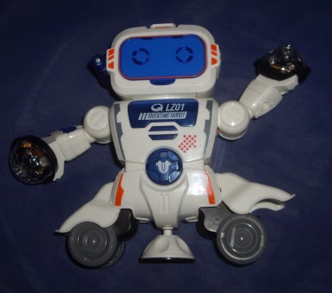 1) Музична іграшка - Робот - висота- 18 см,ширина- 27 см. Працює на з-х пальчико. . фото 5