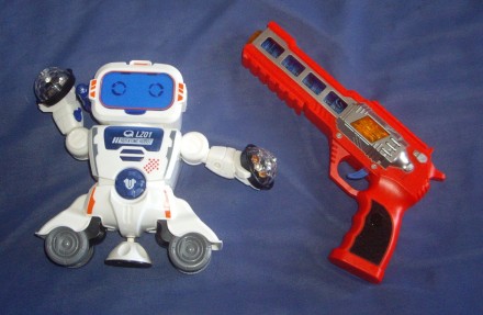 1) Музична іграшка - Робот - висота- 18 см,ширина- 27 см. Працює на з-х пальчико. . фото 2