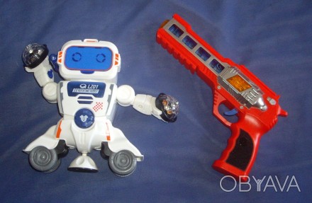 1) Музична іграшка - Робот - висота- 18 см,ширина- 27 см. Працює на з-х пальчико. . фото 1