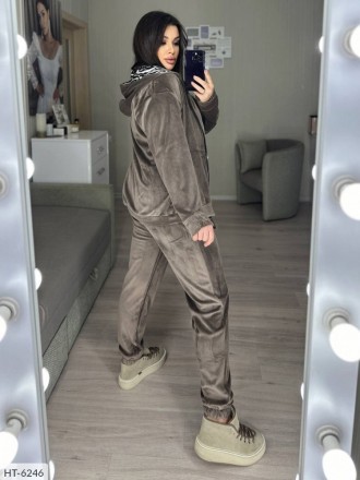 Прогулочный костюм HT-6250
Костюм велюровый
Кофта и брюки
Кофта на молнии
Ткань:. . фото 6
