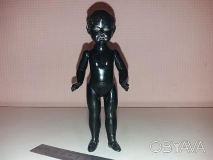 Небольшая кукла из черного целлулоида. 30-е гг.