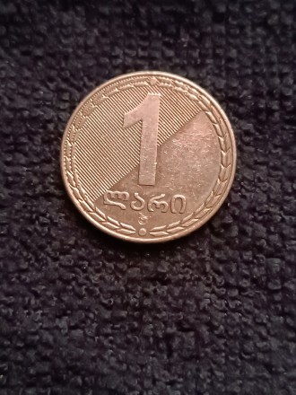 Монети Грузії номіналом 10-20тетрі 1993рік ціна 30грн, 1ліра 2006рік ціна 15 грн. . фото 2