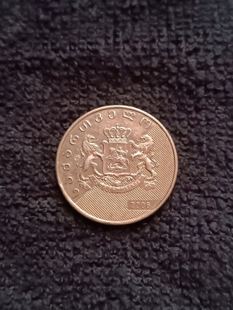 Монети Грузії номіналом 10-20тетрі 1993рік ціна 30грн, 1ліра 2006рік ціна 15 грн. . фото 4