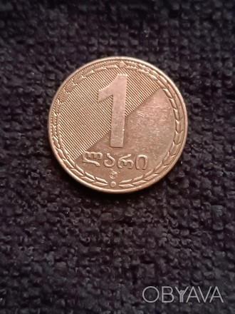 Монети Грузії номіналом 10-20тетрі 1993рік ціна 30грн, 1ліра 2006рік ціна 15 грн. . фото 1