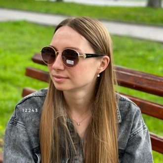 
Сонцезахисні окуляри - головний і невід'ємний атрибут образу сучасної дівчини.В. . фото 5