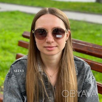 
Сонцезахисні окуляри - головний і невід'ємний атрибут образу сучасної дівчини.В. . фото 1