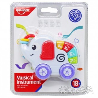 Милая игрушка для малышей в виде слоненка. Имеет 4 кнопочки с нотами и большую к. . фото 1