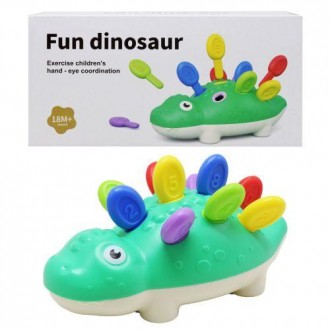 Пластиковая игрушка в виде динозавра. Состоит из 2 частей, который необходимо со. . фото 2