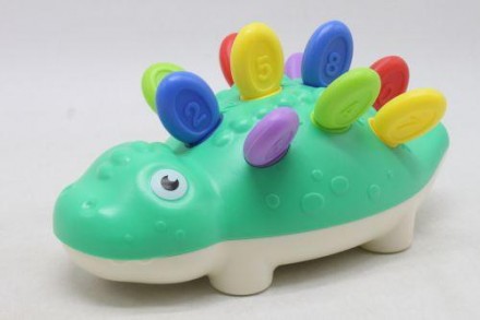 Пластиковая игрушка в виде динозавра. Состоит из 2 частей, который необходимо со. . фото 3
