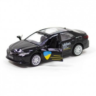 Крута, ретельно деталізована іграшка у вигляді машини популярної служби таксі. І. . фото 3