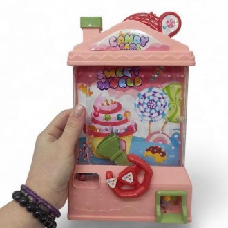 Игрушка "Игровой автомат: Candy Game". Сверху игрушки есть отверстие, в которое . . фото 3