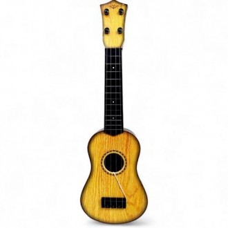 Четырехструнная гитара (укулеле), маленький дубликат настоящего инструмента. Име. . фото 2