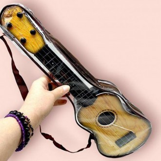 Четырехструнная гитара (укулеле), маленький дубликат настоящего инструмента. Име. . фото 3