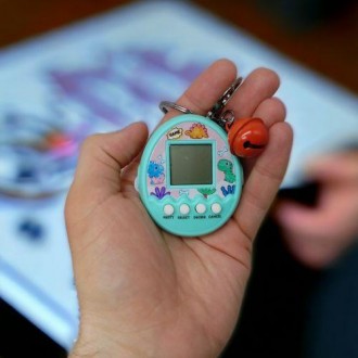 Классическая электронная игрушка "Tamagotchi", с которой ребенок сможет вырастит. . фото 3