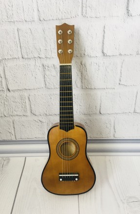 Гитара детская деревянная арт. 1370
Струны металлические (6 шт).
В комплекте с г. . фото 3