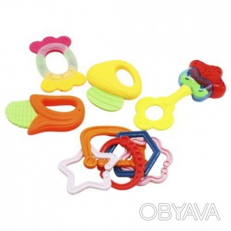 Набор из пяти погремушек представляет собой разнообразные игрушки для младенцев,. . фото 1