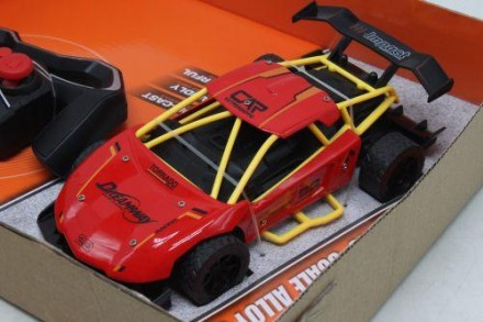 Іграшка на радіокеруванні у вигляді крутого гоночного автомобіля. Їздить у всіх . . фото 3
