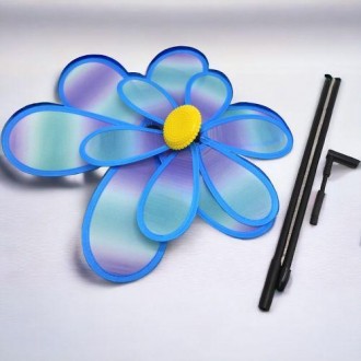 Яркая игрушка-ветрячок. Игрушка состоит из 2-х основ в виде текстильного цветочк. . фото 4