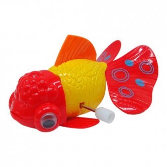 Яркая заводная игрушка в виде рыбки. Чтобы запустить игрушку, нужно провернуть к. . фото 2