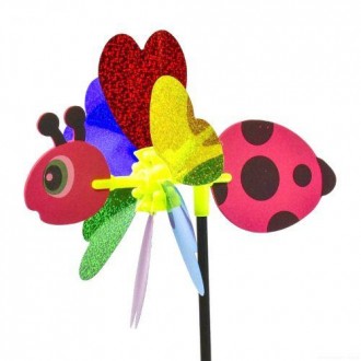 Яскравий барвистий вітрячок. Іграшка складається з м'якої основи у вигляді комах. . фото 2