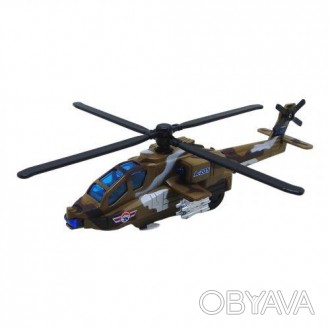 Дитяча іграшка у вигляді реалістичного вертольота. Під час руху іграшки лопаті п. . фото 1