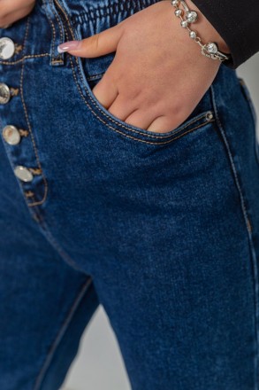 жіночі джинси з карманами синього кольору. . фото 5