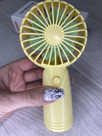 Портативный ручной мини вентилятор с аккумулятором Cute Electric Fan
 
Маленький. . фото 6