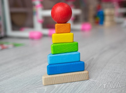 Деревянные пирамиды – это классическая игрушка, которая привлекает детей уже на . . фото 1