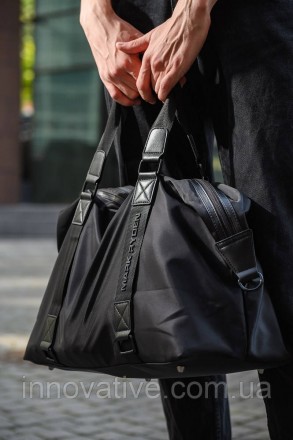 Дорожная сумка черного цвета от Mark Ryden сделает ваши поездки или походы в спо. . фото 9