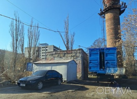 Объект расположен в районе Ивановского моста на территории предприятия с общим в. Малиновский. фото 1