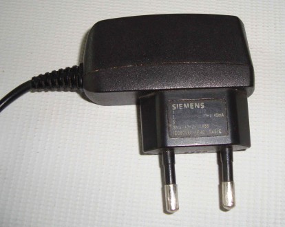 Зарядний пристрій Siemens Astec DA2-3101UK-англ.вилка-Оригінал телефона 
Зарядн. . фото 6