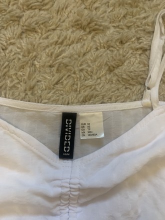 Блуза- топ фірми H&M. Розмір XS. Колір білий. Стан чудовий. Довжина без урах. . фото 6