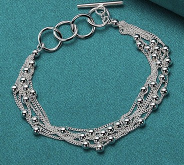Жіночий браслет зі срібла з родієвим покриттям складається з шести ланцюжків та . . фото 3