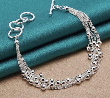Жіночий браслет зі срібла з родієвим покриттям складається з шести ланцюжків та . . фото 2
