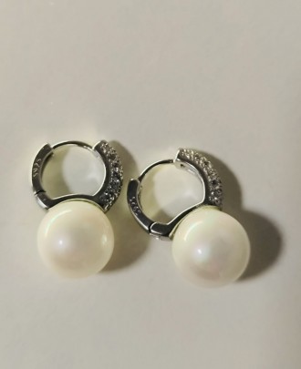 Жіночі сережки зі стерлінгового срібла S925 проби.
Довжина 2,0 см. Діаметр перли. . фото 4