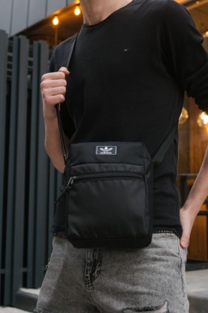 
 
 Барсетка чорна Mod з декоративним пришивним логотипом Adidas:
- Розмір: 25 x. . фото 2