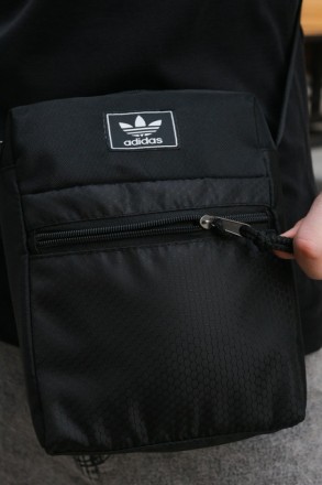 
 
 Барсетка чорна Mod з декоративним пришивним логотипом Adidas:
- Розмір: 25 x. . фото 10