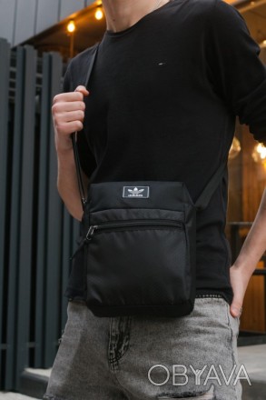 
 
 Барсетка чорна Mod з декоративним пришивним логотипом Adidas:
- Розмір: 25 x. . фото 1