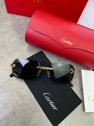 
 
 Солнцезащитные очки Cartier Black CT0271S
Производитель : Китай 
Размер : 58. . фото 2