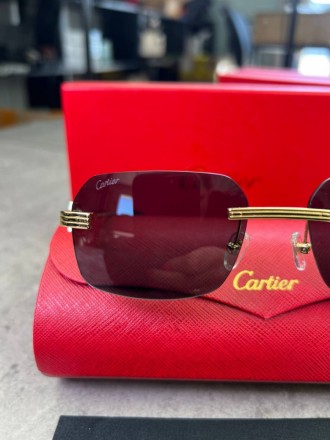 
 
 Солнцезащитные очки Cartier Black CT0271S
Производитель : Китай 
Размер : 58. . фото 5