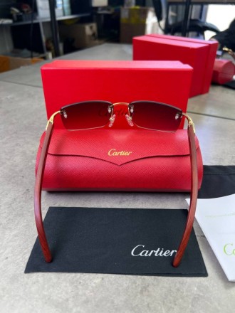 
 
 Солнцезащитные очки Cartier с деревянными дужками и коричневыми стеклами
Про. . фото 8