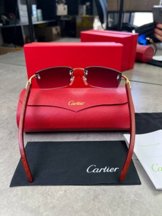 
 
 Солнцезащитные очки Cartier с деревянными дужками и синими стеклами
Производ. . фото 8