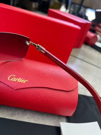 
 
 Солнцезащитные очки Cartier с деревянными дужками и синими стеклами
Производ. . фото 10