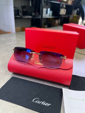 
 
 Солнцезащитные очки Cartier с деревянными дужками и синими стеклами
Производ. . фото 4